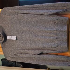 New with tags shimmery turtle neck.